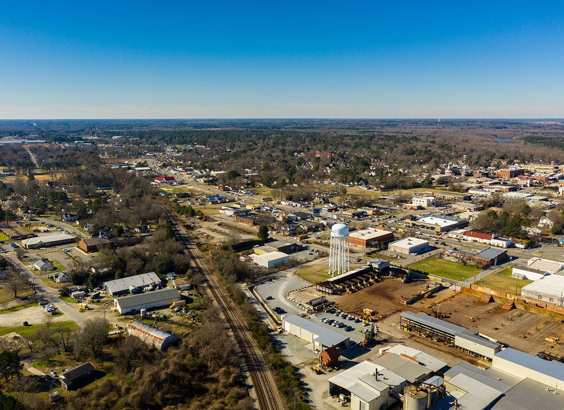 Jonesville, NC - Aerial View of the Small Town of Jonesville North Carolina Surrounded by Green Foliage on a Sunny Fall Day